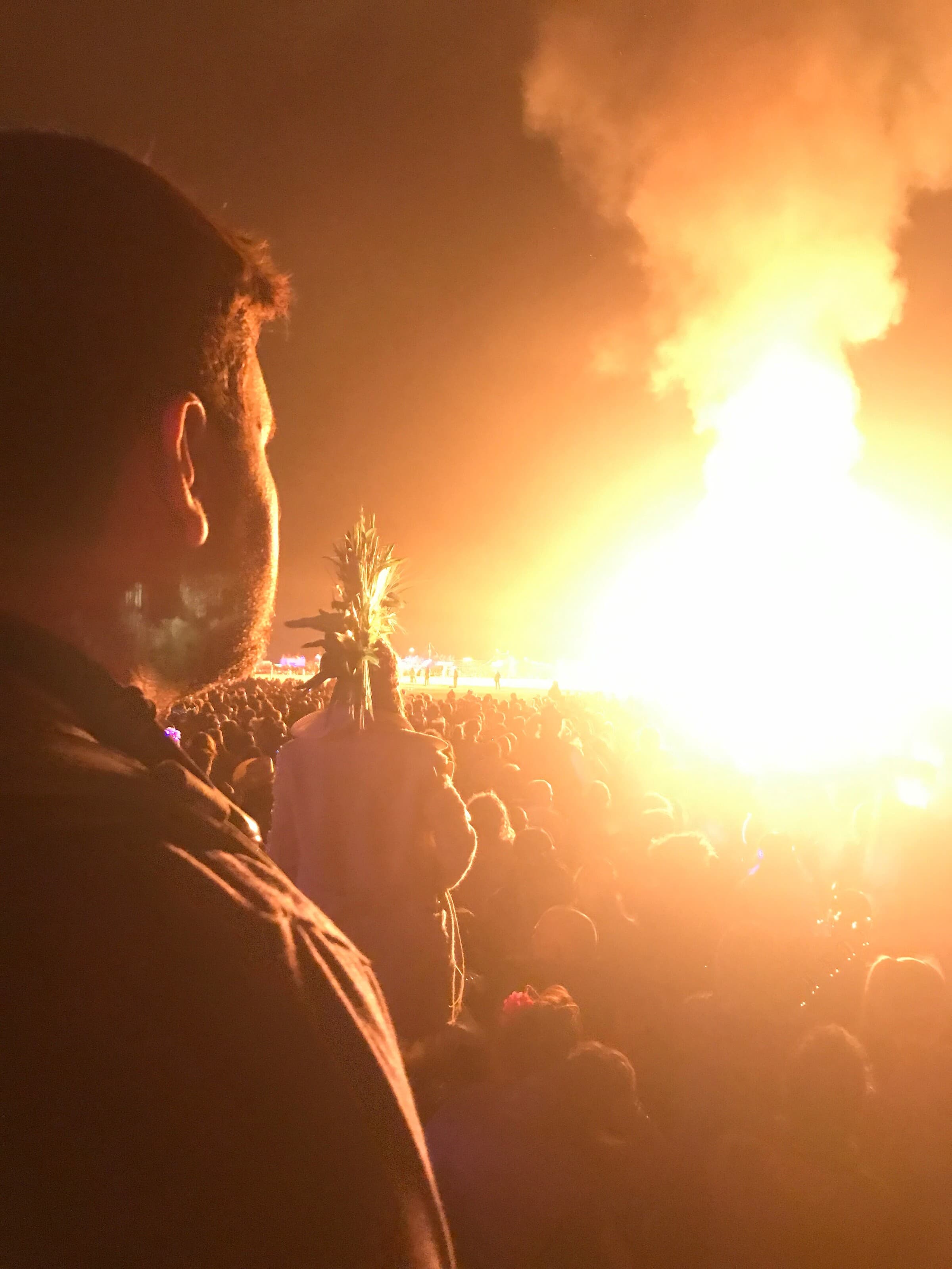 Taylor watching the Burning Man fire